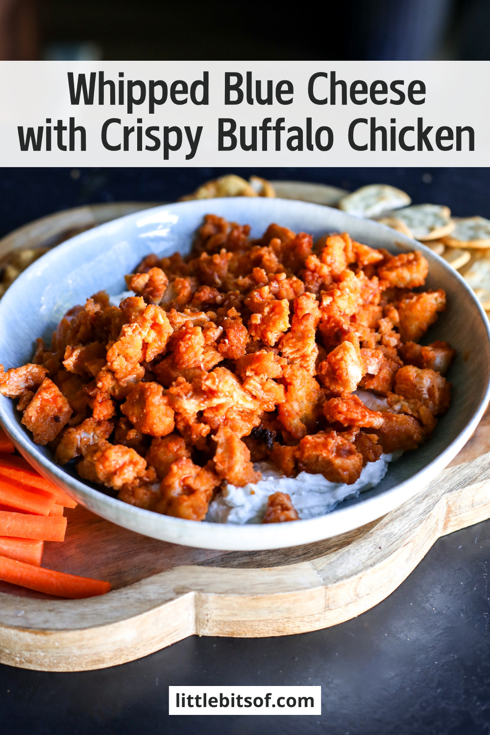 The ultimate game day dip! Creamy whipped blue cheese topped with crispy buffalo chicken nuggets. Quick and easy.
