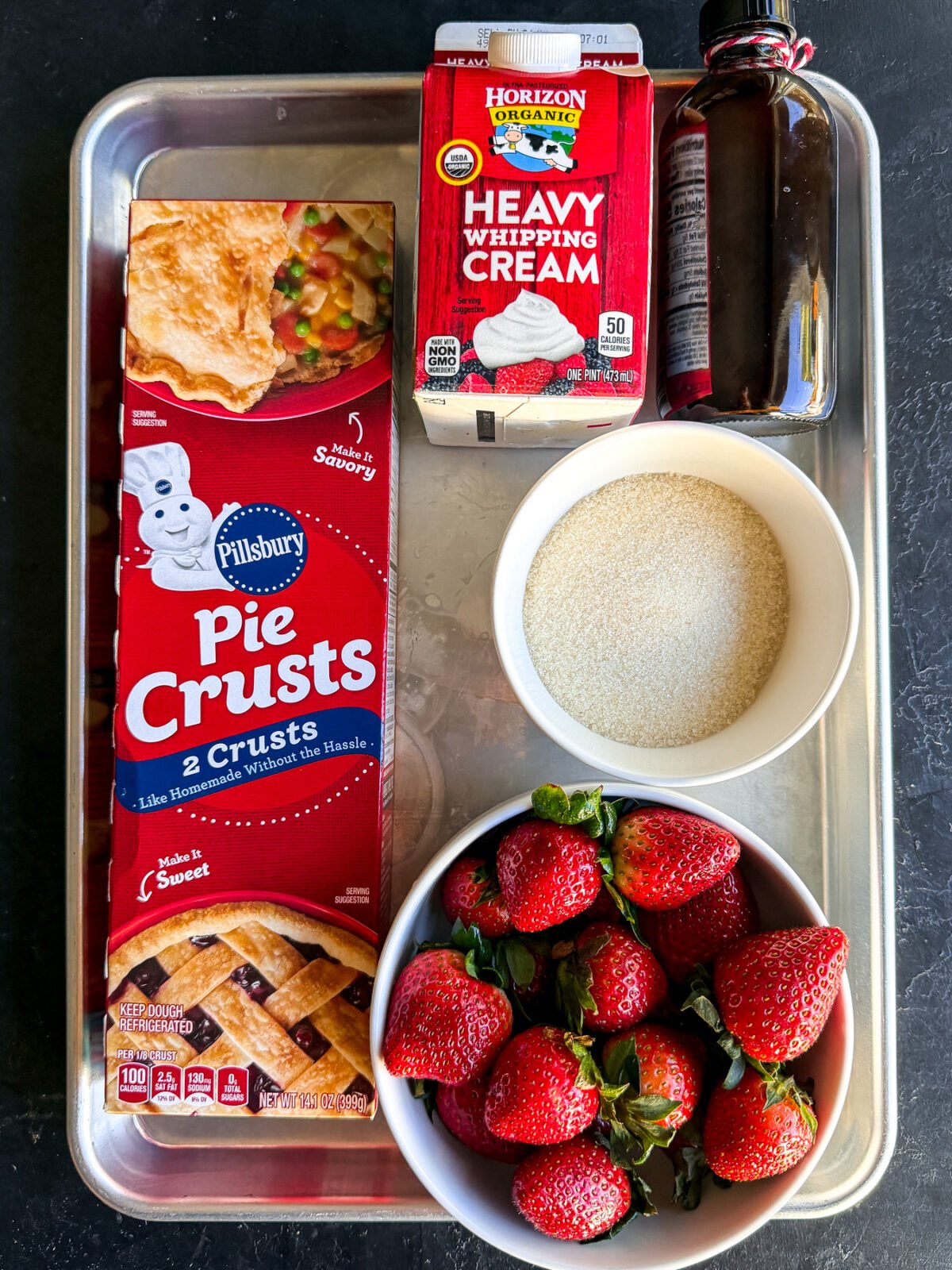 The easiest dessert! Flaky pie crust rounds topped with sweet, juicy strawberries and cream. Ready in just 15 minutes.