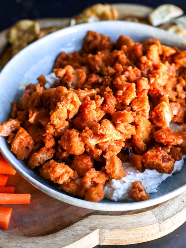 The ultimate game day dip! Creamy whipped blue cheese topped with crispy buffalo chicken nuggets. Quick and easy.
