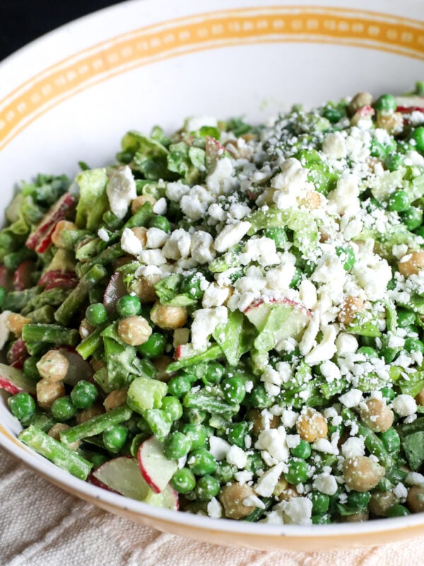 Creamy Feta Herb Dressing meets crisp spring veggies. This chopped salad is healthy, vibrant, and ready in minutes.