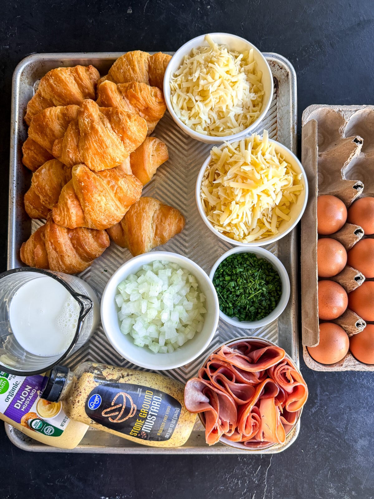 Upgrade your breakfast with this decadent Ham and Cheese Croissant Bake. Golden, bubbly, and perfect for a crowd!