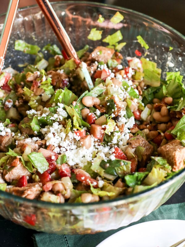 Healthy strawberry & white bean chopped salad with balsamic grilled chicken, pecans & goat cheese. Easy summer lunch!