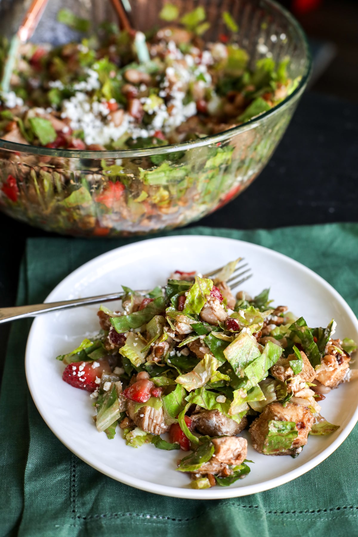 Healthy strawberry & white bean chopped salad with balsamic grilled chicken, pecans & goat cheese. Easy summer lunch!
