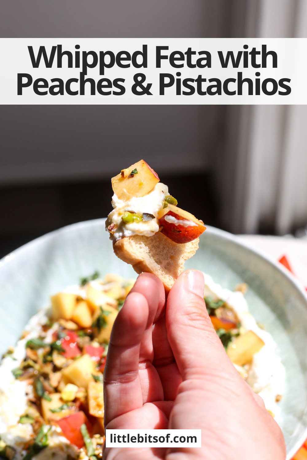 Creamy whipped feta topped with fresh peaches, pistachios, and hot honey makes an easy, crowd-pleasing summer appetizer.
