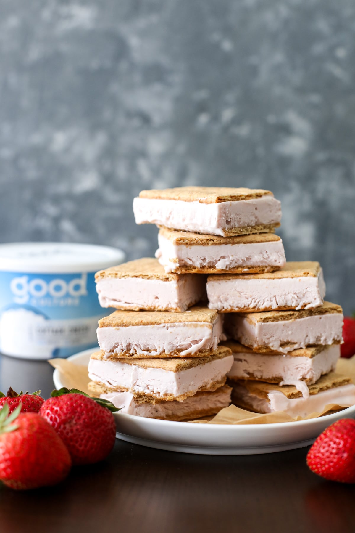 Make Strawberry Cheesecake Ice Cream Bars with cottage cheese, fresh strawberries, and graham crackers for a high-protein treat.