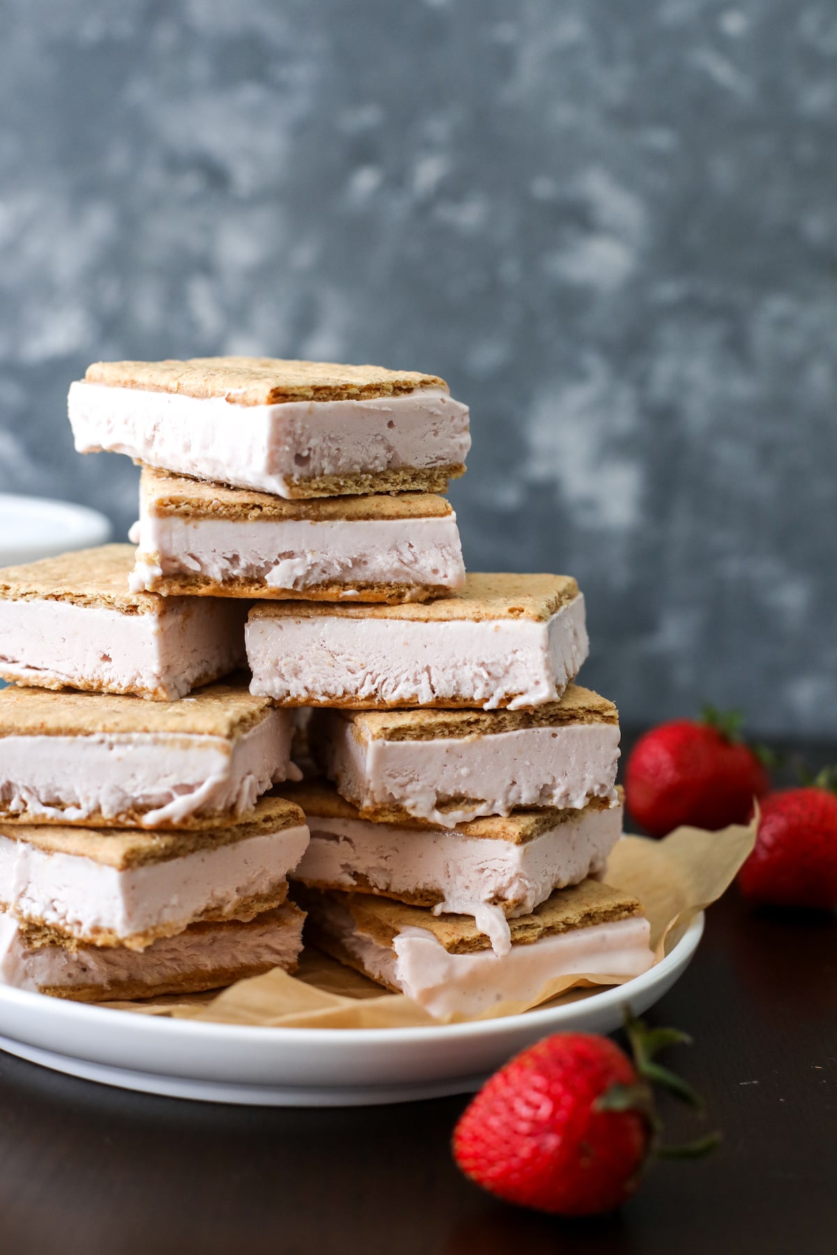 Make Strawberry Cheesecake Ice Cream Bars with cottage cheese, fresh strawberries, and graham crackers for a high-protein treat.