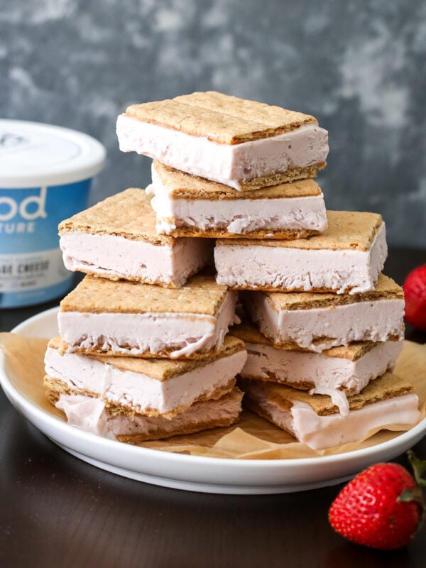 Make Strawberry Cheesecake Ice Cream Bars with cottage cheese, fresh strawberries, and graham crackers for a high-protein treat.
