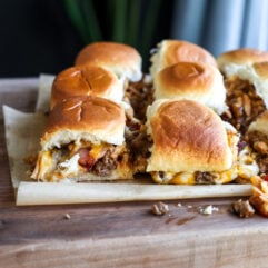 These Western Bacon Cheeseburger Sliders are packed with BBQ sauce, crispy bacon, cheddar cheese, and Hawaiian rolls—the ultimate easy game day recipe!