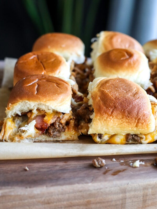 These Western Bacon Cheeseburger Sliders are packed with BBQ sauce, crispy bacon, cheddar cheese, and Hawaiian rolls—the ultimate easy game day recipe!