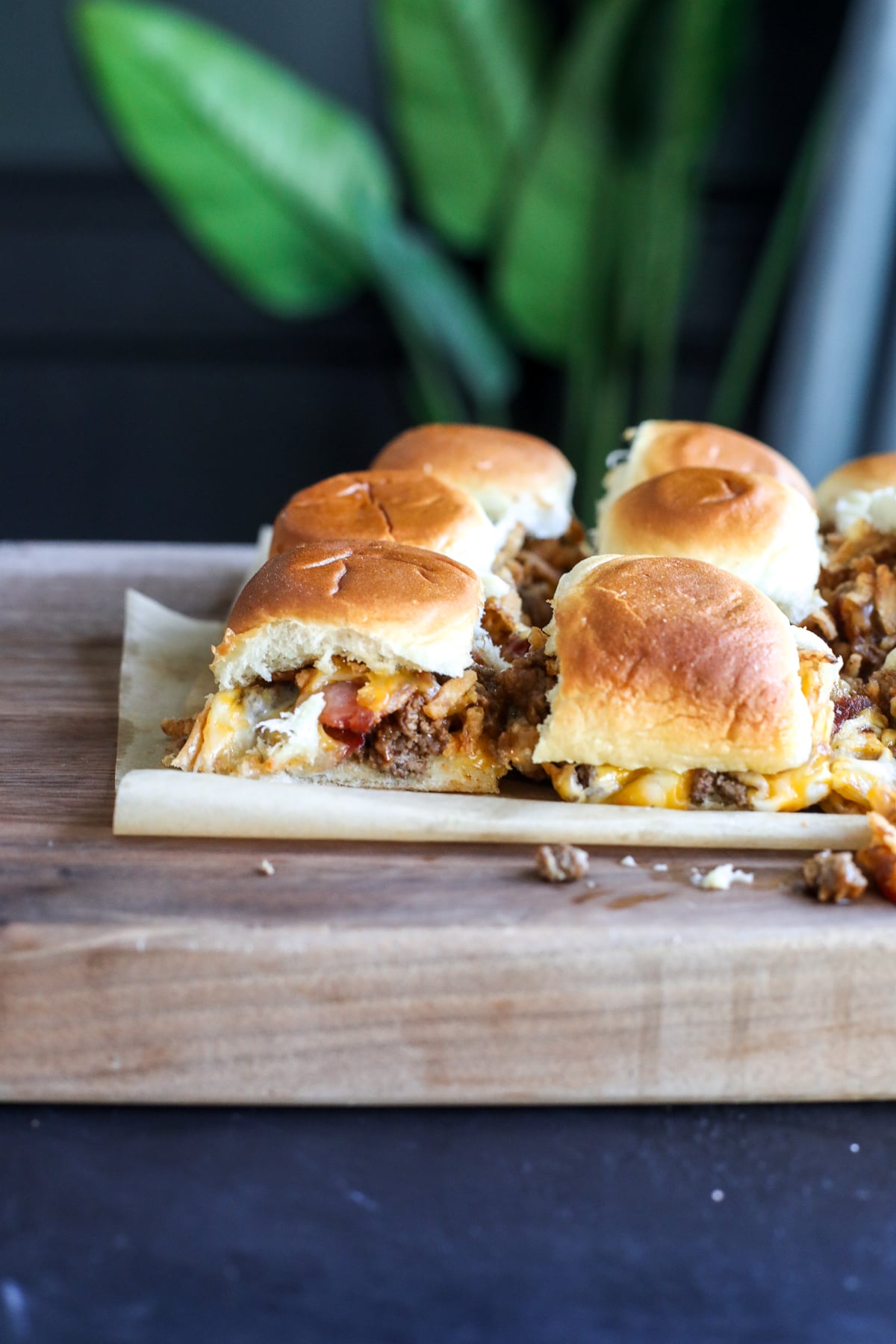 These Western Bacon Cheeseburger Sliders are packed with BBQ sauce, crispy bacon, cheddar cheese, and Hawaiian rolls—the ultimate easy game day recipe!