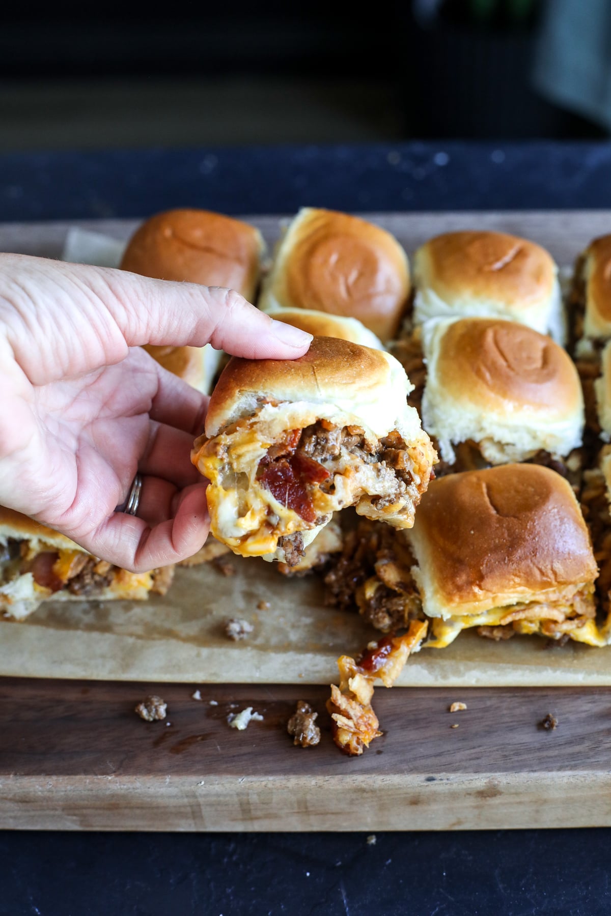 These Western Bacon Cheeseburger Sliders are packed with BBQ sauce, crispy bacon, cheddar cheese, and Hawaiian rolls—the ultimate easy game day recipe!