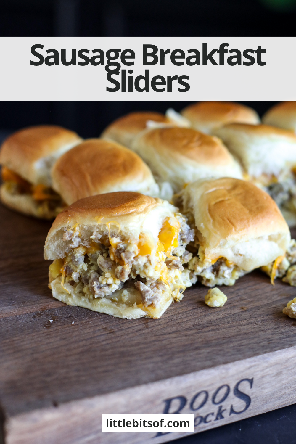 Easy sausage breakfast sliders made with eggs, cheddar cheese, and maple butter on Hawaiian rolls. A crowd-pleasing brunch recipe.