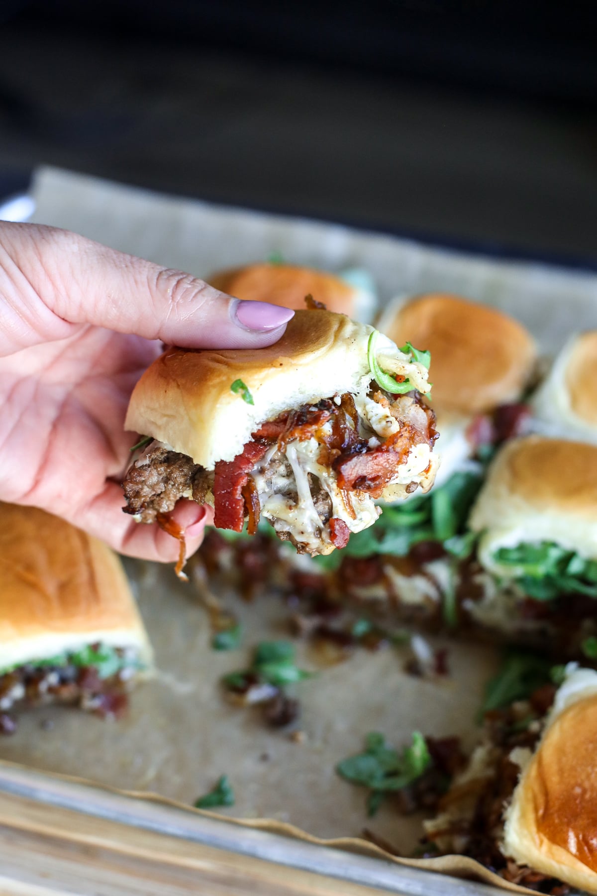 Office Burger Sliders loaded with bacon onion jam, Gruyère, blue cheese and arugula for an easy, flavor-packed twist on the iconic burger.