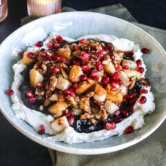 This Cranberry Pear Whipped Goat Cheese is the perfect holiday appetizer with creamy goat cheese, cranberry chutney, maple pecans, fresh pears and pomegranate!